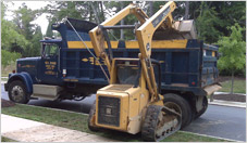 Track Loader Loading Debris